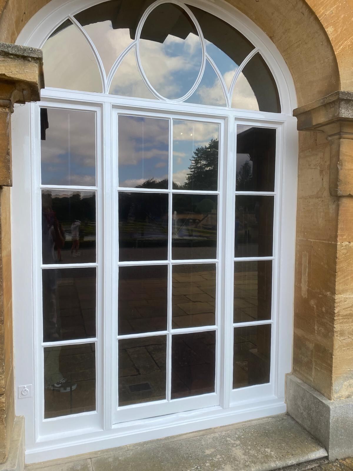 Finished arched Georgian window with Gothic tracery painted by Brierty Decoration at Blenheim Palace