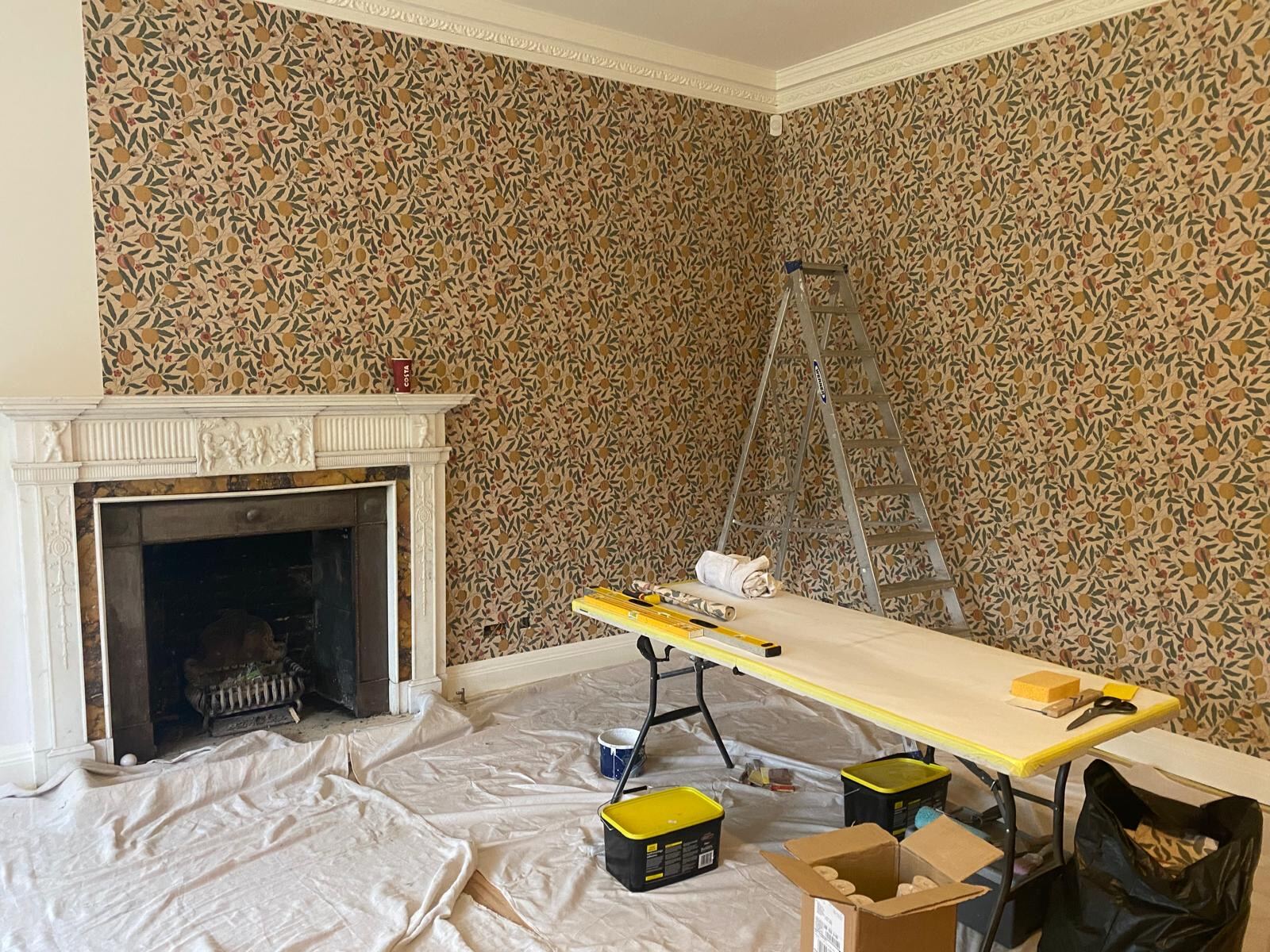 Hand-hung William Morris 'Fruit' wallpaper executed for a SAAL Design Cotswolds project
